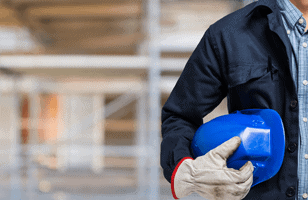 person holding a blue hart hat on their side 