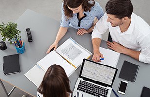 three people having a meeting, birds eye view 