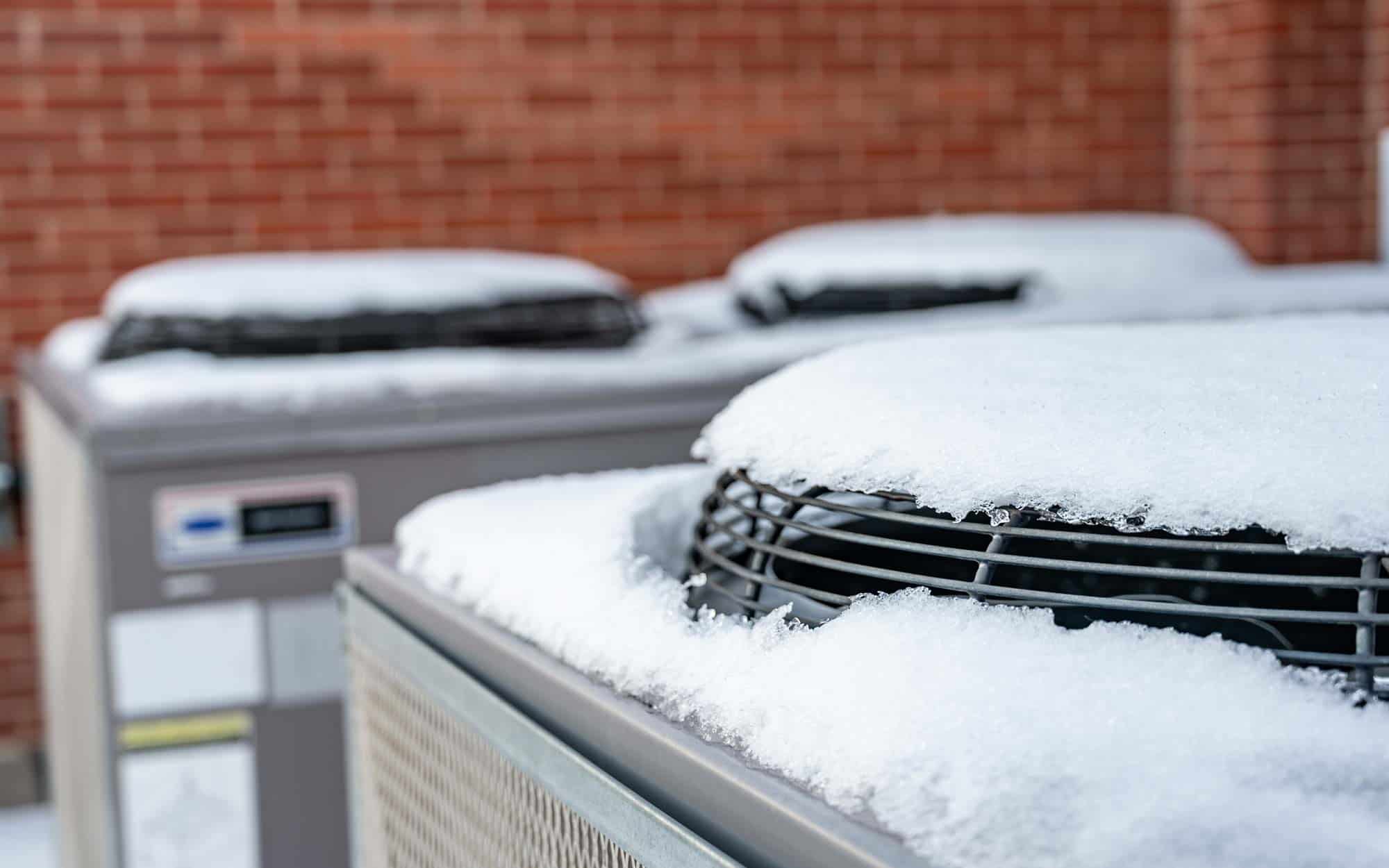 snow covered HVAC unit